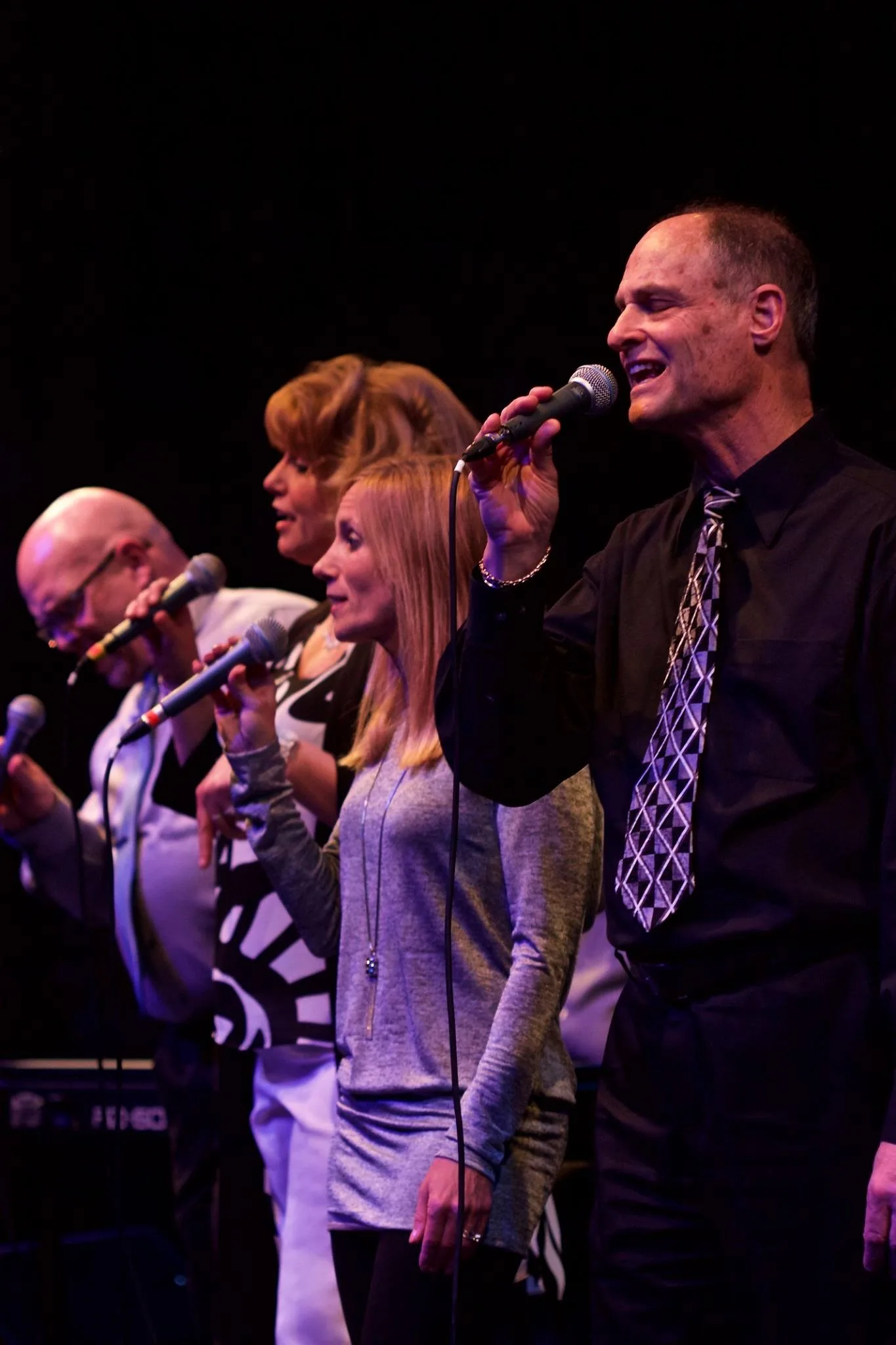 Jazz Spectrum vocal quartet performing at a formal concert